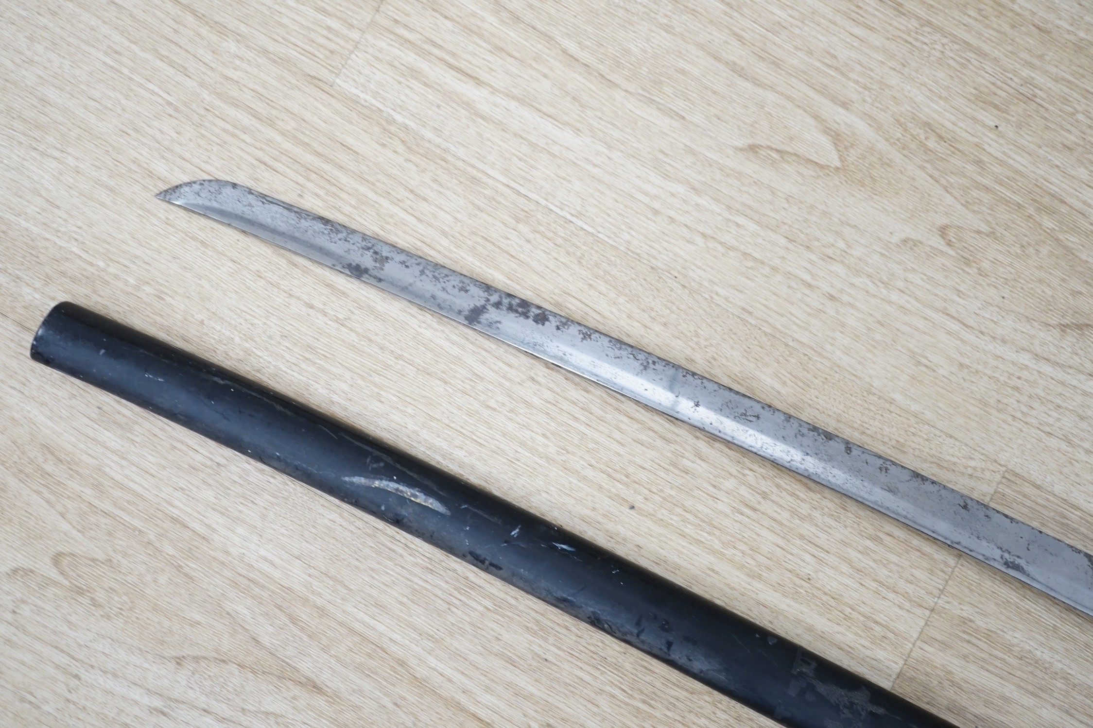 An early 20th century Japanese sword and saya, total length 102cm